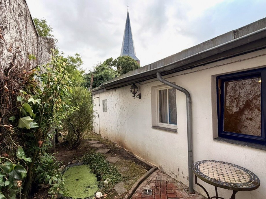 16 seitlicher Garten.jpeg Reihenmittelhaus Bedburg
